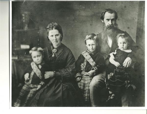 James and Jessie with their sons; Daniel, Malcolm D., and James